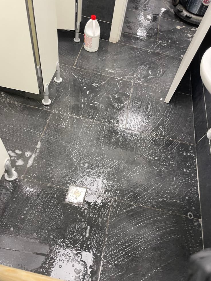 Tiled floors washed down with detergent after finishing works